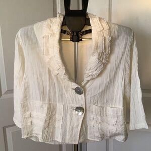 Stunning linen short jacket, European made never worn. One size fits most.